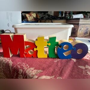 Wooden names puzzle piece for child’s bedroom. MATTEO